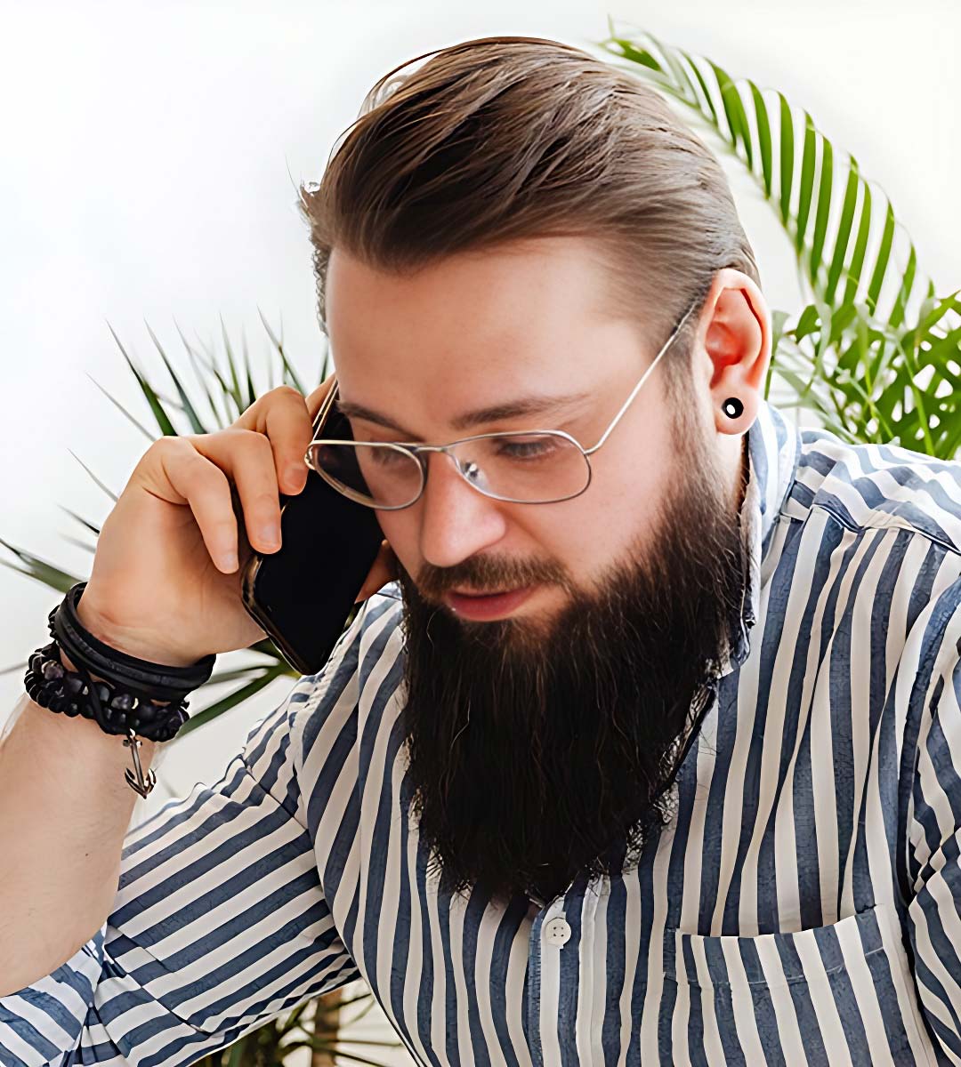 Man with Long Beard on Phone Man with Long Beard on Phone